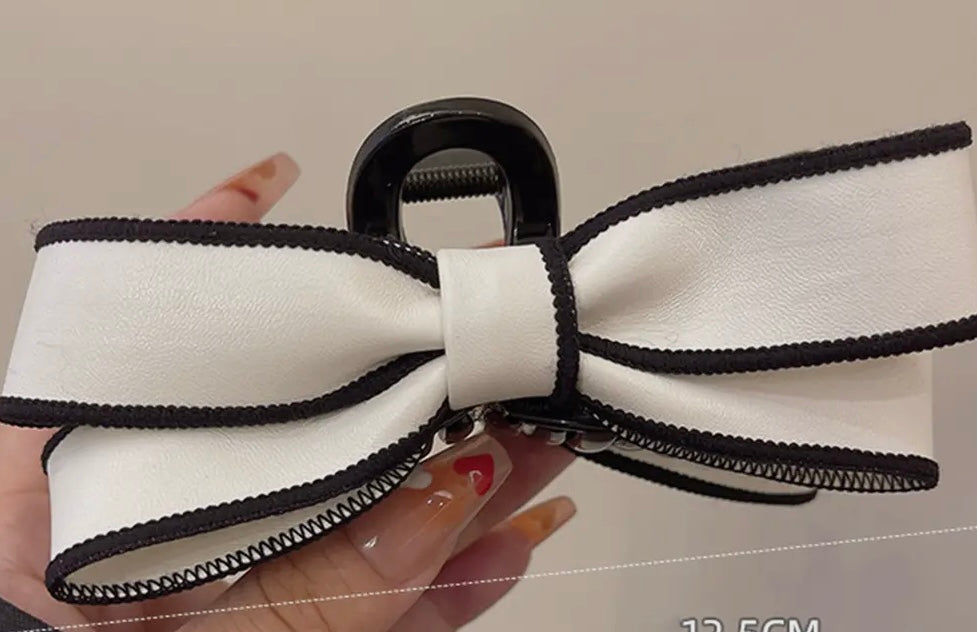 White with black stitch claw clip