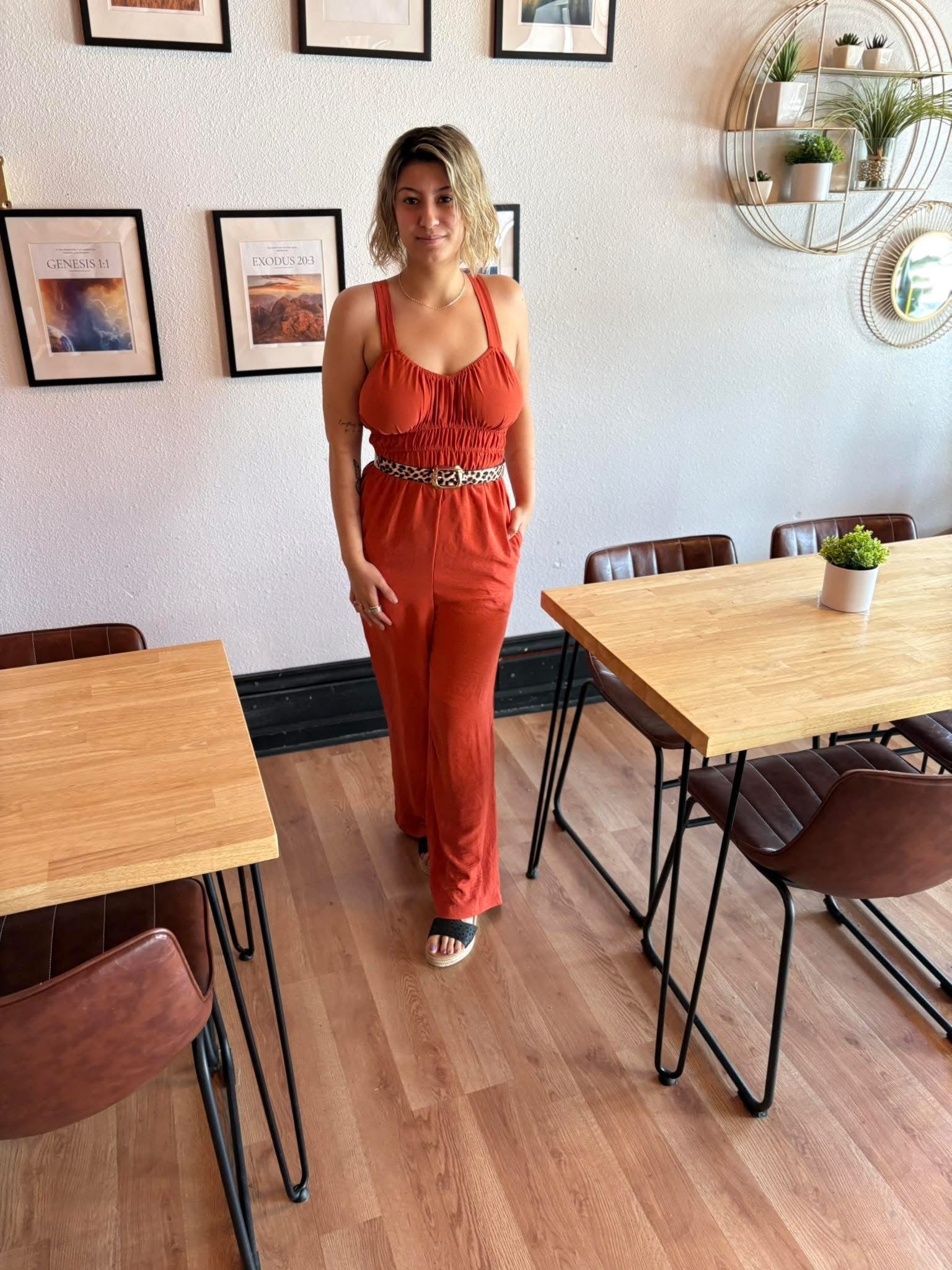 Something in the orange romper