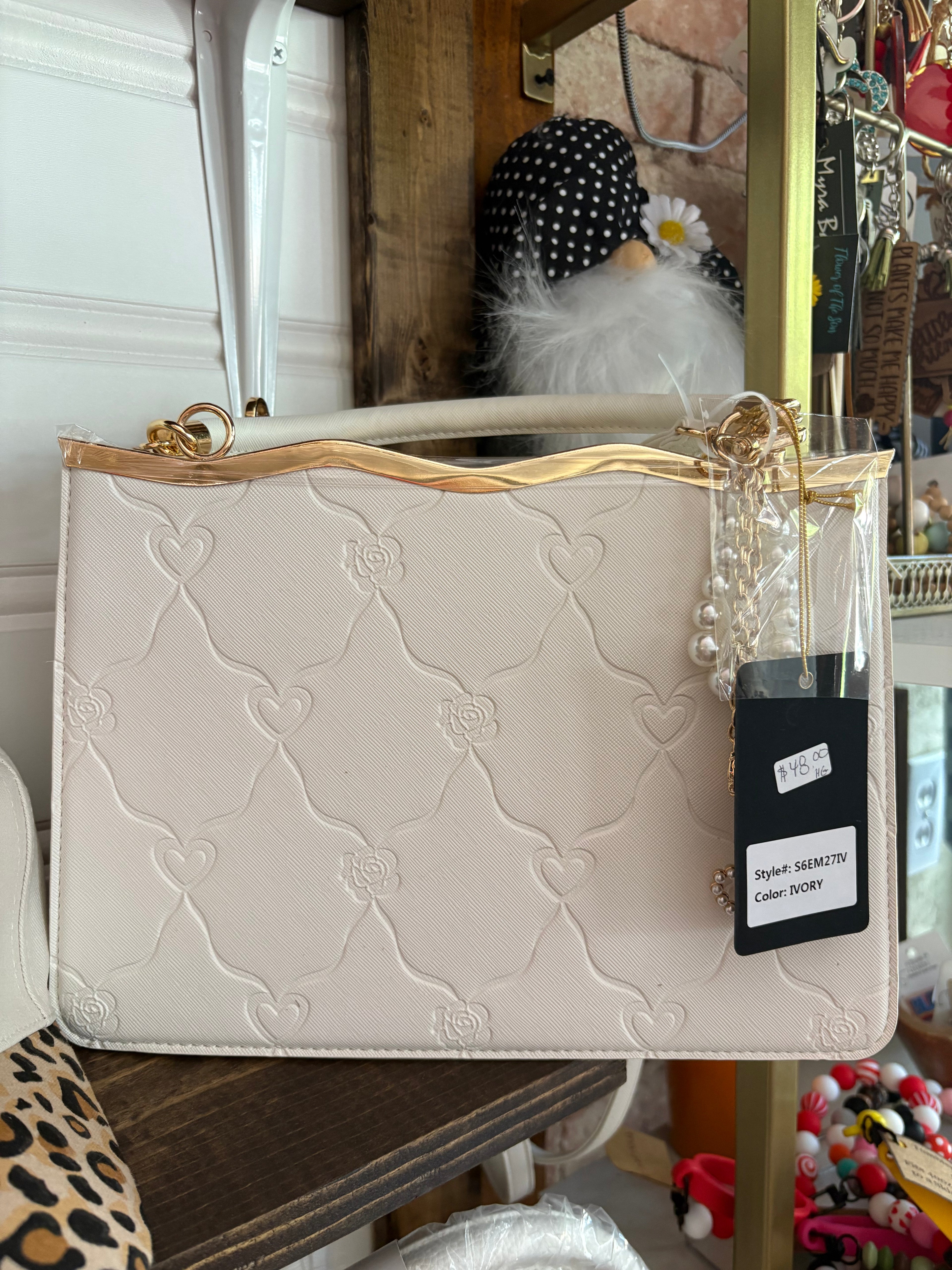 Whimsical gold rod purse